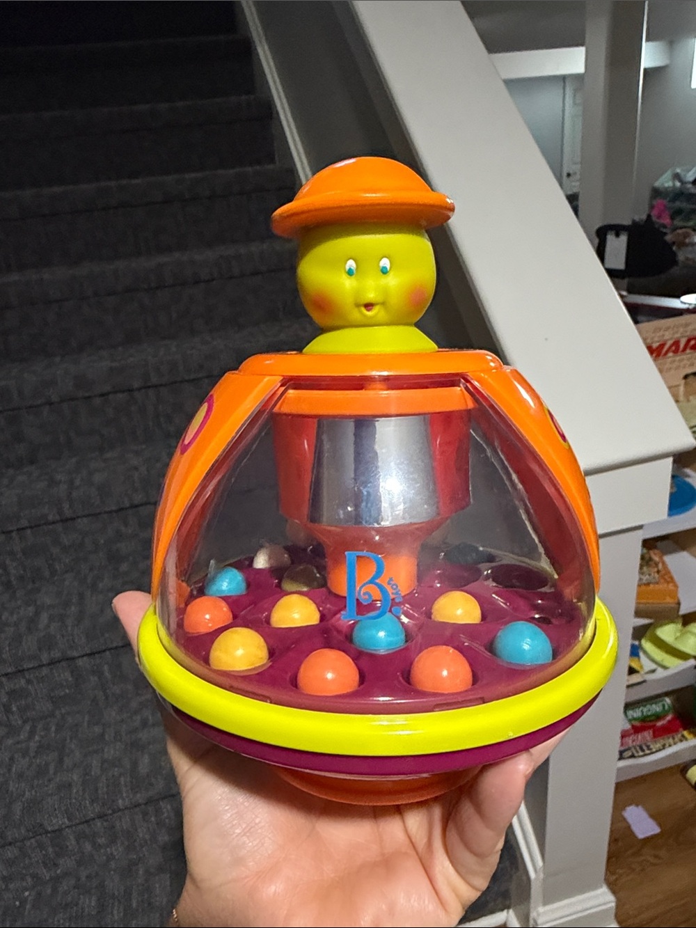 Classic Pop-Up Spinner Game Toy in Orange and Yellow by B Toys